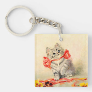 Kitten mit einem roten Band Schlüsselanhänger