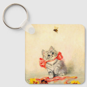 Kitten mit einem roten Band Schlüsselanhänger