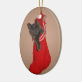 Kitty in einer Strumpfverzierung Keramikornament (Links)