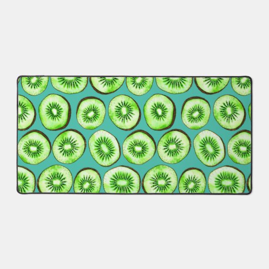 Kiwi-Scheiben auf Türkis Schreibtischunterlage (Vorderseite)