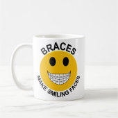 Klammern stellen lächelnde Gesichts-Kaffee-Tasse Kaffeetasse (Links)