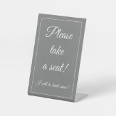 Klasse, elegant: "Bitte nehmen Sie Platz!" Sockelschild (Vorderseite)