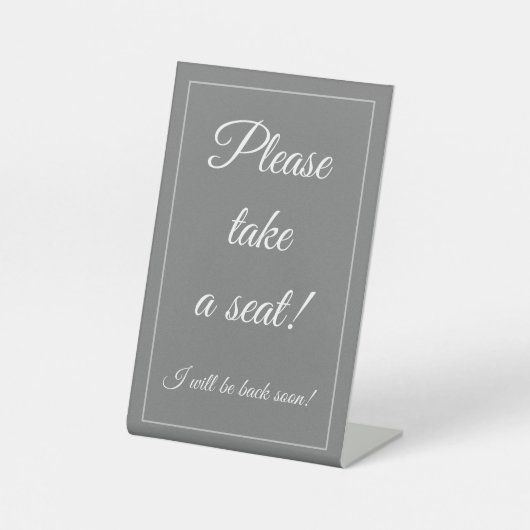 Klasse, elegant: "Bitte nehmen Sie Platz!" Sockelschild (Vorderseite)