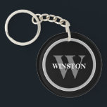 Klassische Monogramm: Personalisiert Schwarz, Weiß Schlüsselanhänger<br><div class="desc">Mit unserem "Classic Monogram" Schlüsselanhänger verbinden sich Eleganz und Funktionalität perfekt. Dieses raffinierte Accessoire ist für diejenigen gedacht, die einen klassischen Stil mit einer persönlichen Touch schätzen. Das elegante Schwarz-, Weiß- und Grau-Farbschema verströmt zeitlose Eleganz, die jedes Set von Tasten ergänzt. Personalisieren Sie diesen Schlüsselanhänger mit Ihrem Monogramm, indem Sie...</div>
