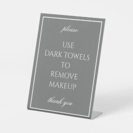Klassischer, dunkelgrauer Handtuchzähler mit klass Sockelschild