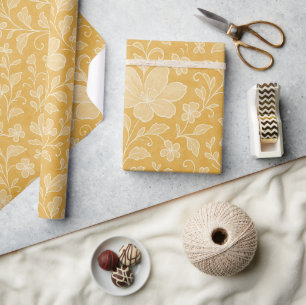 Klassisches Blatt-Blumenkunstmuster auf Ocker-Gelb Geschenkpapier