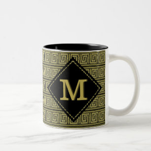 Klassisches griechisches Schlüsseldesign in Gold u Zweifarbige Tasse