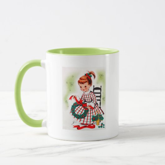 Klassisches Weihnachtskleines Mädchen mit Tasse (Links)