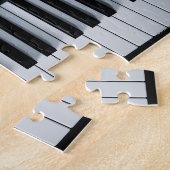 Klaviertasten und Musikbuch Puzzle (Seite)