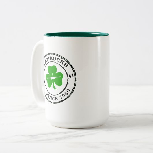 KLEEBLATT SEIT 1960 ZWEIFARBIGE TASSE (Vorderseite Links)