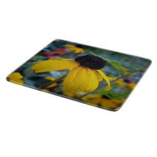 Kleine gelbe Blume Schneidebrett