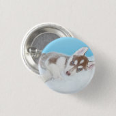 Kleine Husky-Welpe, die auf der Decke spielt Button (Vorne & Hinten)