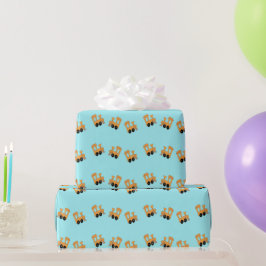 Kleine orangefarbene Züge auf blau Geschenkpapier