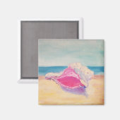 Kleine, rosa Muschel auf Sand durch Sea Magnet (Vorderseite/Rückseite)