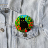 Kleine schwarze Katze in einem Tulip-Garten Button (Beispiel)