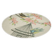 Kleine Vögel, die auf einem Zweig und auf einem Vo Schneidebrett (Ecke)