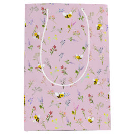 Kleine Wildblume ist auf dem Weg zur Babydusche Mittlere Geschenktüte