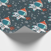 Kleiner Astronaut mit Weihnachtshut Geschenkpapier (Ecke)
