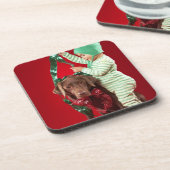 Kleiner Junge, der einen Hund verziert Untersetzer (Linke Seite)