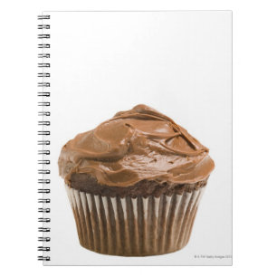 Kleiner Kuchen mit Schokoladenzuckerglasur, Notizblock