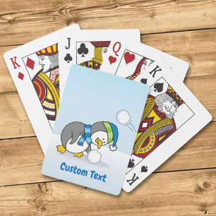 Kleiner Pinguin bekommt ein Schneeballrad beim Spi Spielkarten