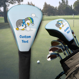Kleiner Pinguin bekommt eine Schneeballgolfkopfabd Golf Headcover