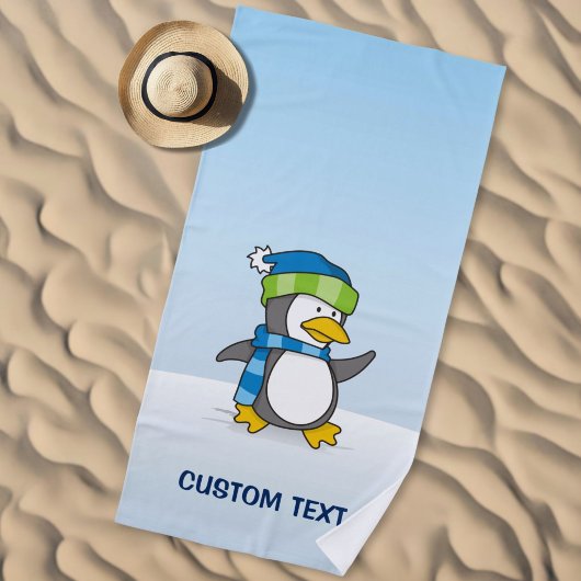 Kleiner Pinguin, der auf Schnee geht Strandtuch