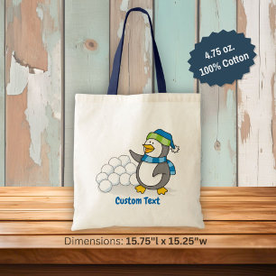 Kleiner Pinguin mit Schneebälle, die Totenbeutel w Tragetasche