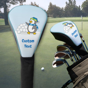 Kleiner Pinguin mit schneebedeckten Bälle mit Golf Headcover