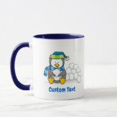Kleiner Pinguin sitzend mit Schneebälle Tasse (Links)