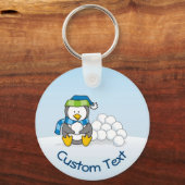 Kleiner Pinguin sitzend mit Snowballs Schlüsselanh Schlüsselanhänger (Vorderseite)