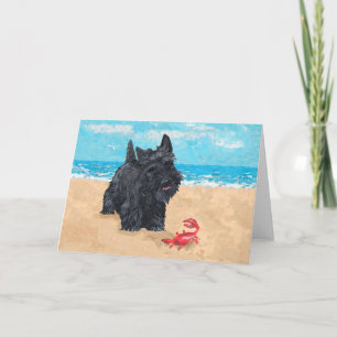 Kleiner Scottie findet einen Krebs am Strand Karte