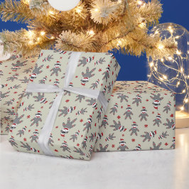Kleiner Sockenaffe mit Weihnachtsmannmütze Beige W Geschenkpapier