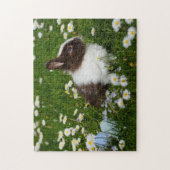 Kleines Braun- und Weißgebälk in Blume Puzzle (Vertikal)