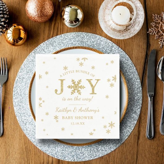 Kleines Bündel von freudlicher Weihnachtsdusche Serviette