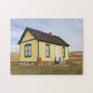 Kleines gelbes Cottage Puzzle