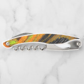 Kleines gelbliches Mosaik und deformiert Kellnermesser (Rückseite)