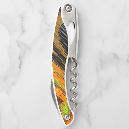 Kleines gelbliches Mosaik und deformiert Kellnermesser (Rückseite)