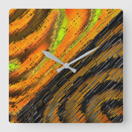 Kleines gelbliches Mosaik und deformiert Quadratische Wanduhr