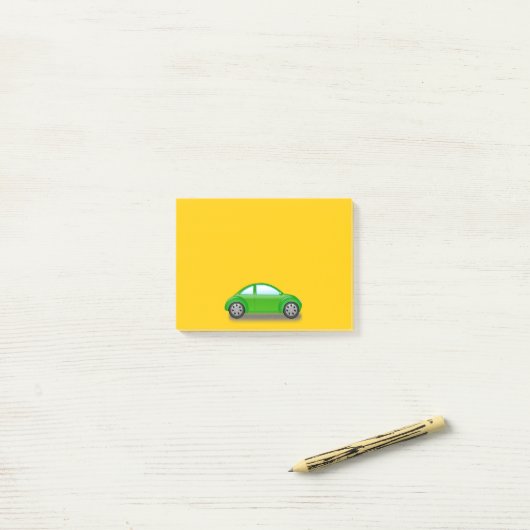 Kleines grünes Auto auf gelbem Pfosten Post-it Klebezettel (Auf Schreibtisch)