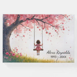 Kleines Mädchen auf einem Kirschbaumschwung Gästebuch
