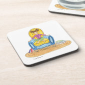 Kleines Mädchen in einem Stuhlgetränk Untersetzer (Linke Seite)