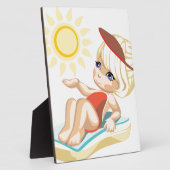 Kleines Mädchen sonnt sich am Strand Fotoplatte (Seite)