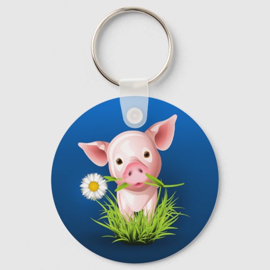 Kleines rosa Schwein in grünem Gras über blau Schlüsselanhänger (Vorderseite)