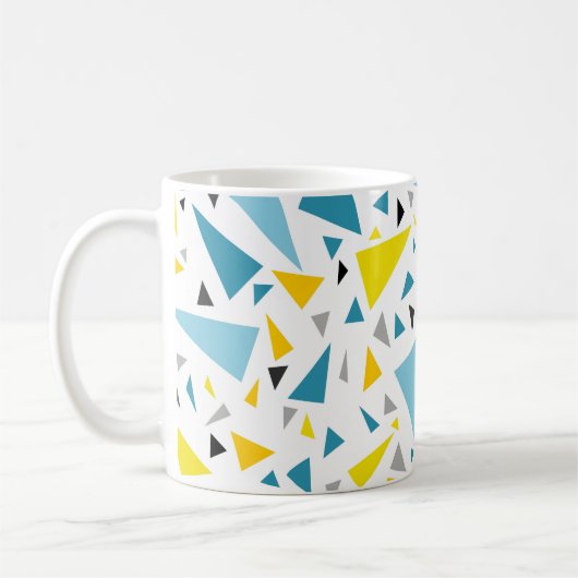 Klicken Sie auf das gelbe und blaue Dreieck, um da Kaffeetasse (Links)