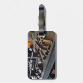 Klinge und Öldose im Maschinenladen Gepäckanhänger (Rückseite vertikal)