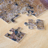 Klippen-Gesicht mit Wasserfall-und Puzzle (Seite)