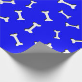 Knochen auf blauem Hintergrundpapier, mit kundensp Geschenkpapier (Ecke)