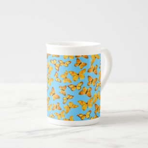 Knochen-China-Tasse, goldene Schmetterlinge auf Porzellantasse