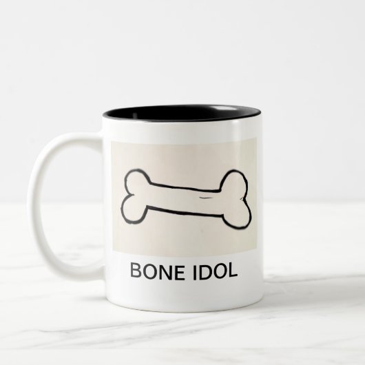 KNOCHEN-IDOL ZWEIFARBIGE TASSE (Links)